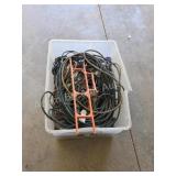 Tote of assorted electrical cords and power