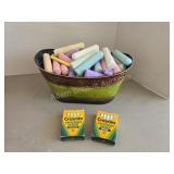 Assortment sidewalk chalk and decorative tin