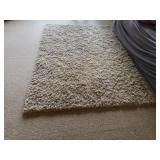 Brown luxury shag area rug, approx 5 ft x 8 ft