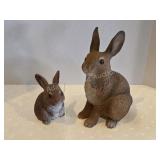 2 plastic resin rabbit figurines