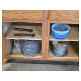 Cabinet clean out - fencing supplies, must take