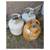 (3) 20 lb propane tanks