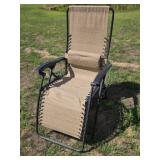 Black and beige zero gravity mesh lawn chair