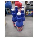 Five Christy 12 oz unopened bottles dry gas