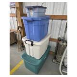 Four miscellaneous plastic storage totes