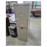 Four drawer metal filing cabinet