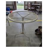 White metal mesh patio table