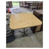 Polished chrome base formica top table