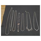 Seven vintage silver tone women