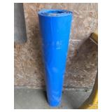 ROLL OF BLUE PASTIC