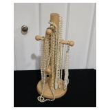 Wooden necklace stand with 10 assorted faux pearl