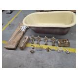 Vintage antique cast iron tub with coffee and