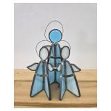 Vintage three-sided stained glasscaroling angels