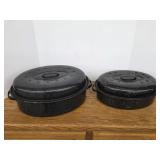 Two vintage black granite ware oval roasting pans