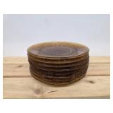 7 vintage amber glass plates in the Sandwich