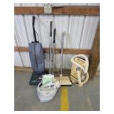 Vintage Singer and Kenmore vacuums with bags