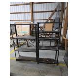 Two vintage black metal shelving unit,