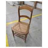 Vintage antique solid wood cane bottom chair