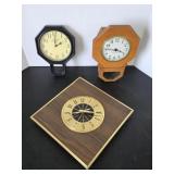 Three assorted wall clocks, battery operated