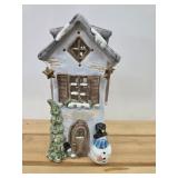 ceramic luminary tea light house featuring a