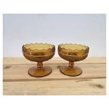 Vintage amber glass footed candles bowls in the