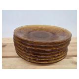 7 vintage amber glass plates in the Sandwich