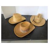 Three assorted vintage straw hats, sizes small