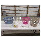 Assorted laundry baskets, clothesline, clothes