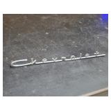 VINTAGE 1957 CHEVROLET SCRIPT EMBLEM TRIM