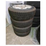 4 Pulse 15-in rims with Blizzak 175/65r15 tires,