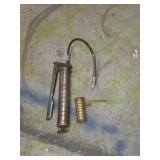 Grease gun and vintage oiler can