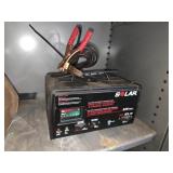 Solar battery charger and engine starter
