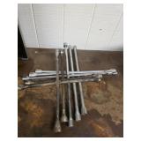 5 assorted four-way lug wrenches