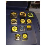 11 assorted measuring tapes