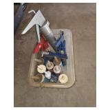 Box lot assorted caulk guns and supplies