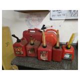 7 assorted plastic gas cans