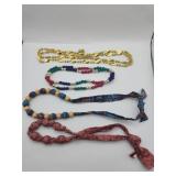 Wood and plastic beaded necklaces