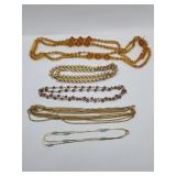 Orange gemmed necklaces