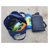 Summer beach blanket and miscellaneous bags.