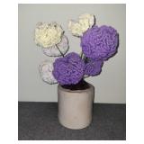 Glass vase with crochet flowers