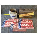 License plates and tin gas can
