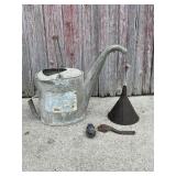 Watering can, funnel, wrench, ball