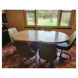 Dining Table with Rolling Chairs