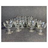 Glass goblets rimmed with silver