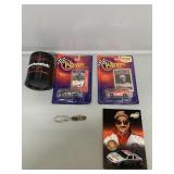 Dale Earnhardt matchbox cars, beer can cooler, and