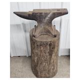 Anvil on Wooden Log