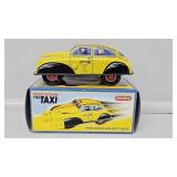 Schylling Press Down Tin Taxi Car