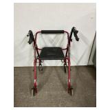 Red Four-Wheel Walker With Seat