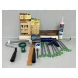Partial Roll Of Banner Paper, Caulk Gun & Caulk