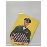 Coca-Cola Delivery Man Embossed Tin Sign